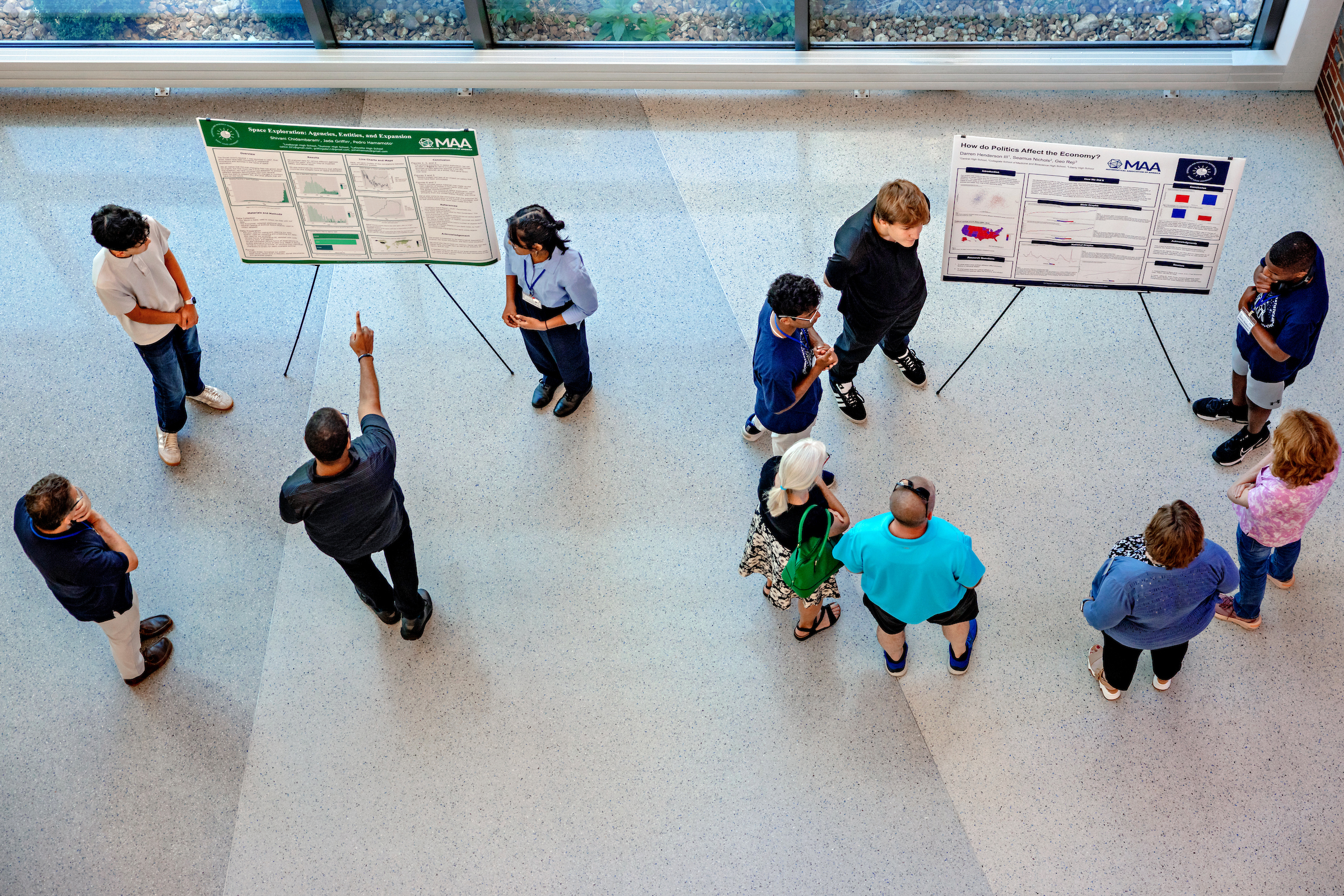 Students presenting at the poster session