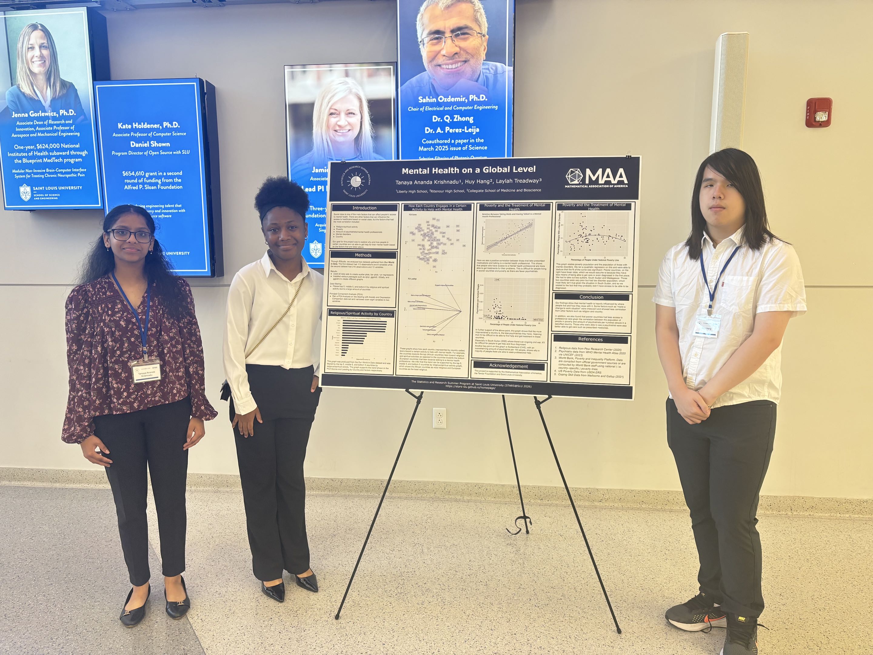 Students presenting at the poster session